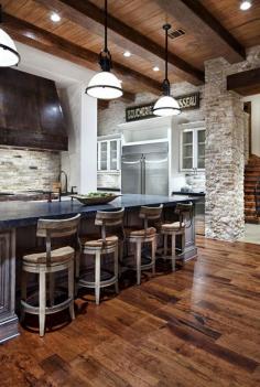 
                        
                            Luxury Home in Texas: When Rustic Meets Modern.. Love the barn floors and island...and vent hood! Love the mixture of wood, stone, and metal. The bar stools remind me of a saloon! love love love
                        
                    