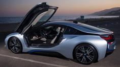 
                        
                            BMW’s fast and fuel-efficient i8 is a hybrid sports car that draws a crowd. It also costs $136,650.
                        
                    