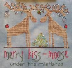 
                    
                        Under The Mistletoe is the title of this cross stitch pattern from MarNic Designs.
                    
                