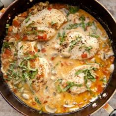 
                    
                        Chicken Chasseur - A delicious and easy French Dinner of Chicken in a wine, lemon Cream Sauce with Mushrooms and Tomatoes.
                    
                