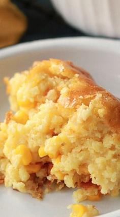 
                    
                        Sweet Corn Spoonbread. Next time I'm invited to dinner, this is the dish I'll bring.
                    
                