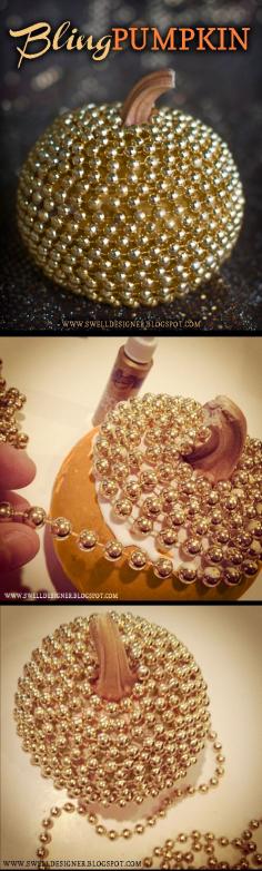 
                        
                            DIY: Make a cool and stylish metallic Bling Pumpkin in no time using tacky glue, gold paint, and a string of gold beads. So simple and different!!
                        
                    