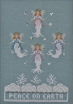 
                    
                        Peace On Earth is the title of this cross stitch pattern from Just Nan that is stitched with DMC and Kreinik Metallics ()32 Blending Filament and #4 Braid 001). The price includes the pattern and embellishment pack only.
                    
                