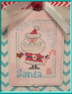 
                    
                        Here Comes Santa is the title of this cross stitch pattern from Designs by Lisa that is stitched with Gentle Art Sampler threads (Silver Fern, Tutti Fruiti, Sweet Petunia, Poppy, Hibiscus, Slate, Soot, Buttermilk, Chalk and Linen).
                    
                