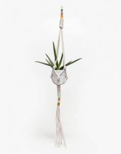 A handmade cotton rope plant hanger from Cold Picnic with colorblock styling and a synthetic core. Features a versatile design for holding both plants and fruits in a hand coiled yarn design.   	•	Cotton rope plant hanger 	•	Colorblock styling 	•	Synt