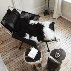 
                    
                        petrified wood side tables, hans wegner chair
                    
                