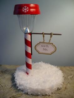 
                    
                        North Pole made out of solar light from dollar store. Boys would love this for their room.
                    
                