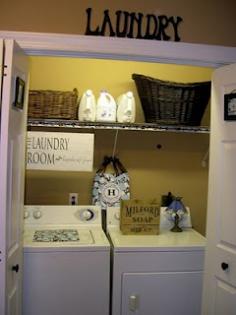 
                    
                        simple laundry closet - cute sign over washer
                    
                