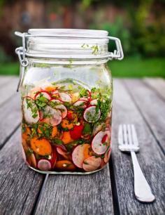 Taco Pickles...a mix of radishes, carrots, jalapeno, cilantro and mix of vinegars to make a relish to put on tacos salads sandwiches or even grilled fish