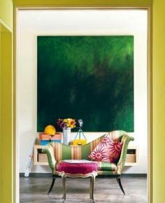 
                    
                        beautifully composed using modern art and antique seating.
                    
                