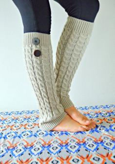 
                    
                        Cozy Taupe Long Leg warmers with big brown buttons. This accessory is so cute to dress up any fall and winter style. And a stylish way to accessorize
                    
                