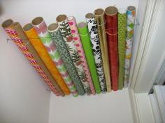 store your wrapping paper on your closet ceiling. why didn't I think of this?