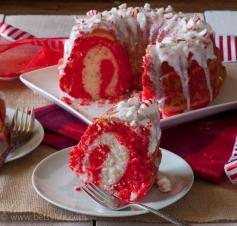 
                    
                        A festive Peppermint Candy Cane Bundt Cake made with a boxed cake mix! An easy and festive holiday dessert |Betsylife.com
                    
                
