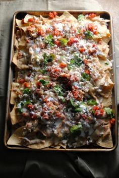 
                    
                        Baked Chicken Nachos
                    
                