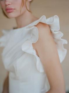 
                    
                        Ruffle sleeved wedding dress
                    
                