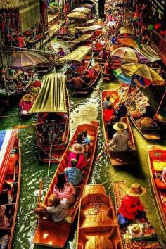 
                    
                        Floating market in Thailand
                    
                