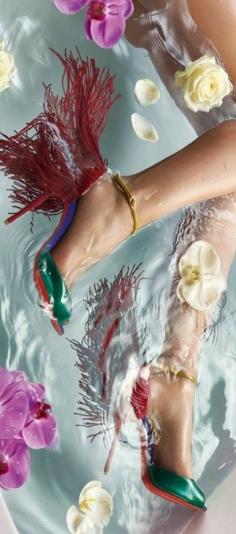 
                    
                        Christian Louboutin
                    
                