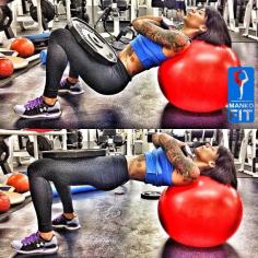 
                    
                        Stability ball glute bridges with a 45lbs plate. This exercise will work your lower back making it look deeper therefore making your glutes appear larger. This exercise will target your glutes making them not only look tighter but rounder! This is a must try!
                    
                