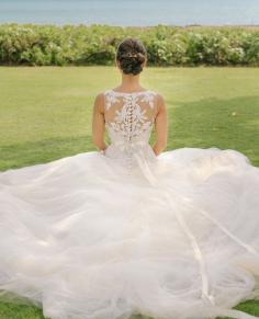 
                    
                        This back of this wedding dress is just perfect (and the wedding is Disney-inspired?) This wedding just gets better and better :)
                    
                