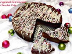
                    
                        Peppermint Bark Flourless Chocolate Cake- this is dense and fudgy and rich and perfect for holiday gatherings.  www.fromcupcakest...
                    
                