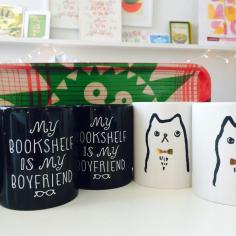
                    
                        Also back in stock! @alisabobzien's adorable Bookshelf + Bowtie Kitty mugs - gifts solved! With @Jonna Saarinen Nautical Plaid tray! #cat #mug #gifts #desk #library #office #books #reading #booklover #catlover #meow #tea #coffee #modern #tabletop #tray #handmade #illustration #screenprint #quote
                    
                