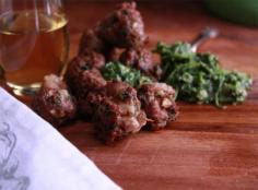 
                    
                        Chorizo Meatballs: spiced meatballs with a caper and herb dipping sauce.  Great hot or cold and easily made ahead of time.
                    
                