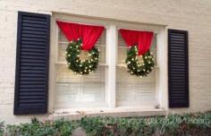 
                    
                        I love how they hung these! Tension rod and curtain, rod loop on each end, curtain through wreath and ends of curtain on rod.
                    
                