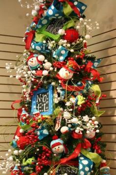 
                    
                        whimsical and colorful snowman tree
                    
                