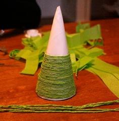 
                    
                        Use paper plates to make mini Christmas trees. WAY cheaper than the styro ones I'm seeing around town.
                    
                