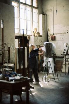 An artist's Studio. Lots of natural light!  I wish this was me.