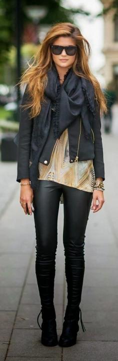 
                    
                        Latest Fashion Trends 2015. Leather looking leggings and light black jacket are very attractive combination.
                    
                