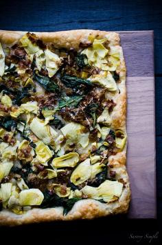 
                    
                        This Spinach, Artichoke and Caramelized Leek Tart is a delicious and flavorful appetizer. Get this easy to follow recipe from Savory Simple!
                    
                