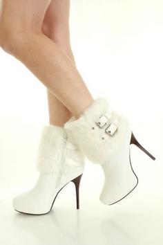 white fur booties for winter wedding. The boots i'll wear while getting ready.