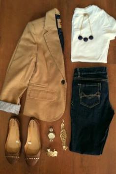 
                    
                        tan blazer with dark jeans; Personally, I'd replace the blazer with a trench coat or a duster.
                    
                