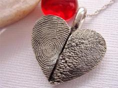 Fingerprint and PawPrint Heart Necklace: I am making this with clay. Then spray painting it and using it as a xmas ornament this year. Good idea to get pet paw print