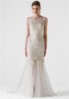 
                    
                        Bateau neck sleeveless gown of heavily embroidered Chantilly lace with tulle godet skirt; Color sampled: Silk White/Nude
                    
                