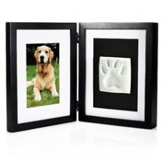 
                    
                        Pawprints Desk Frame.I don't own a Dog, but what a great idea! True puppy love definitely requires a keepsake or two. Keep a picture on one side and an impression of your pet's paw on the other. I love this idea! pearhead.com
                    
                