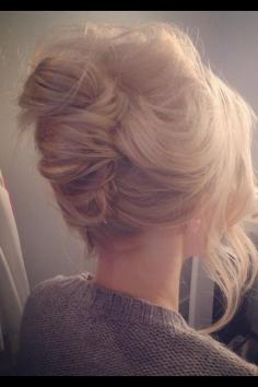 Messy french twist hairstyle.