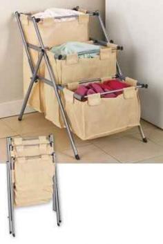 Fold up laundry organizer | 53 Seriously Life-Changing Clothing Organization Tips