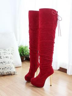 
                    
                        Red thigh high boots
                    
                