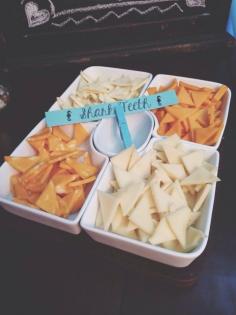 
                    
                        Cut up cheese in to triangles, pair with triangular crackers, label as shark teeth - Under the Sea Party Ideas | Catch My Party
                    
                