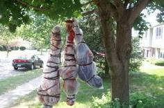 
                    
                        Litter the lawn with some body bag decor. | 27 Disgustingly Awesome Ways To Take Halloween To The Next Level
                    
                