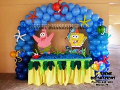 
                    
                        Sponge bob cake table decoration with marine theme balloon arch
                    
                