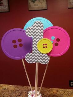 
                    
                        Cute as a button birthday party centerpiece by Kirascollection
                    
                