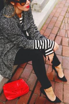 
                    
                        Grey and black wool jacket, black and white striped long sleeve t-shirt, black skinny jeans, black heels, and a red clutch.
                    
                