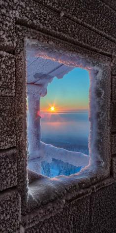 Frosty Sunrise ~ Lapland, Finland. CREDIT:  Julius Rintamäki, "Cold Home" July 26, 2013. Great photo composition - DdO:) - http://www.pinterest.com/DianaDeeOsborne/great-photo-compositions/ - reminds of double mat art. Standing inside to look thru icy window at an angle from dark room.. moving to capture the edge of a stone pillar column of the architecture in the distance. Early cold sunrise over the sea is beautiful itself. This camera work is museum quality ART. Great pin via Janet Williams.