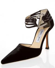 Jimmy Choo Black Velvet Pointed Pumps With Rhinestone Buckle Rich black velvet pumps with thin satin straps around the ankle that connect at a costume-style rhinestone decorative D-ring buckle. I only wore these once.  3.5" heel