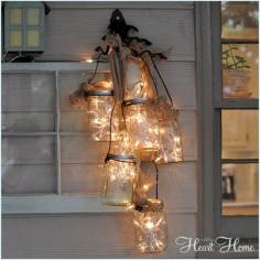 Outdoor lighting with hanging mason jars, burlap and string lights. Love it!!