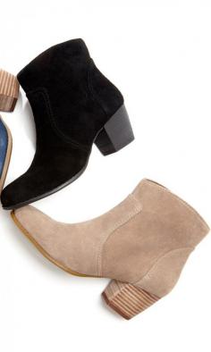 An ankle bootie with an easy side zipper, rounded toe and oh-so-walkable stacked heel.