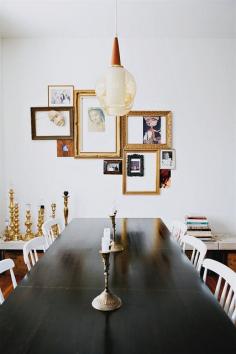 dining room with gallery wall